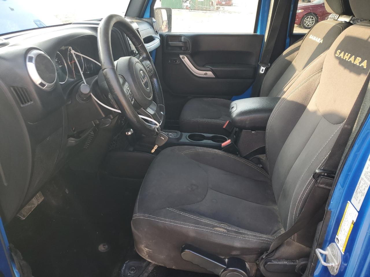 2015 Jeep Wrangler Unlimited Sahara VIN: 1C4BJWEGXFL530627 Lot: 66110795