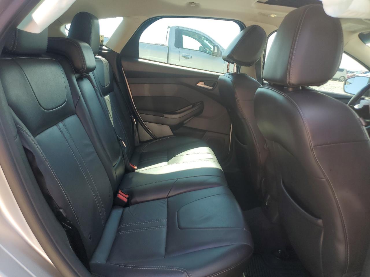 2014 Ford Focus Titanium VIN: 1FADP3N27EL409889 Lot: 63164225