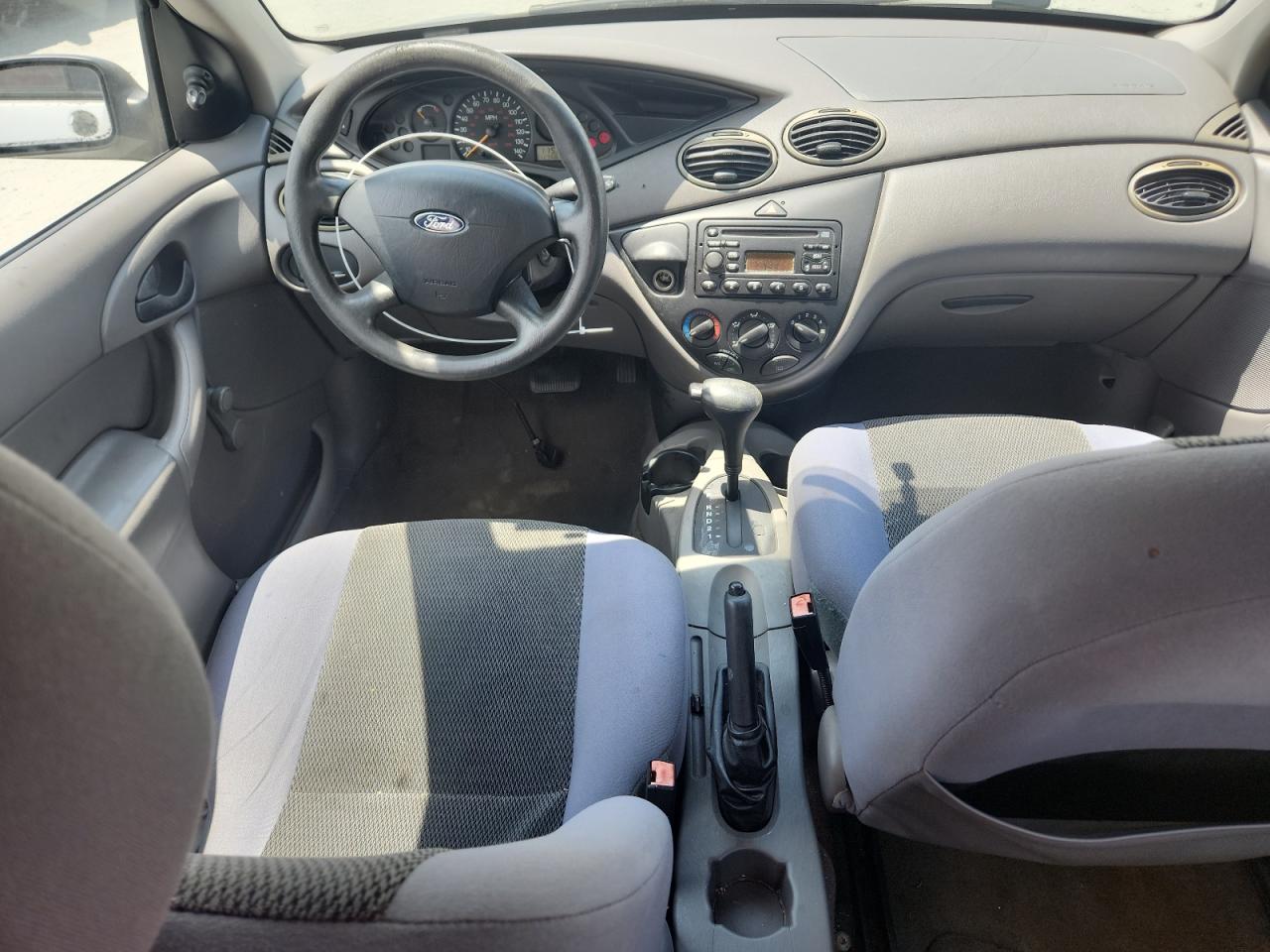 2004 Ford Focus Lx VIN: 1FAFP33P44W149486 Lot: 64574755