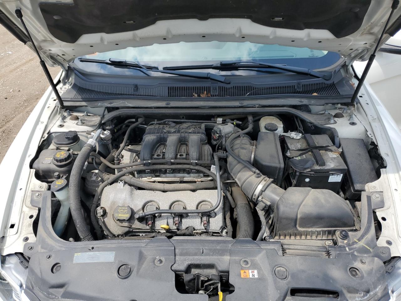 2012 Ford Taurus Sel VIN: 1FAHP2EWXCG106366 Lot: 65345225