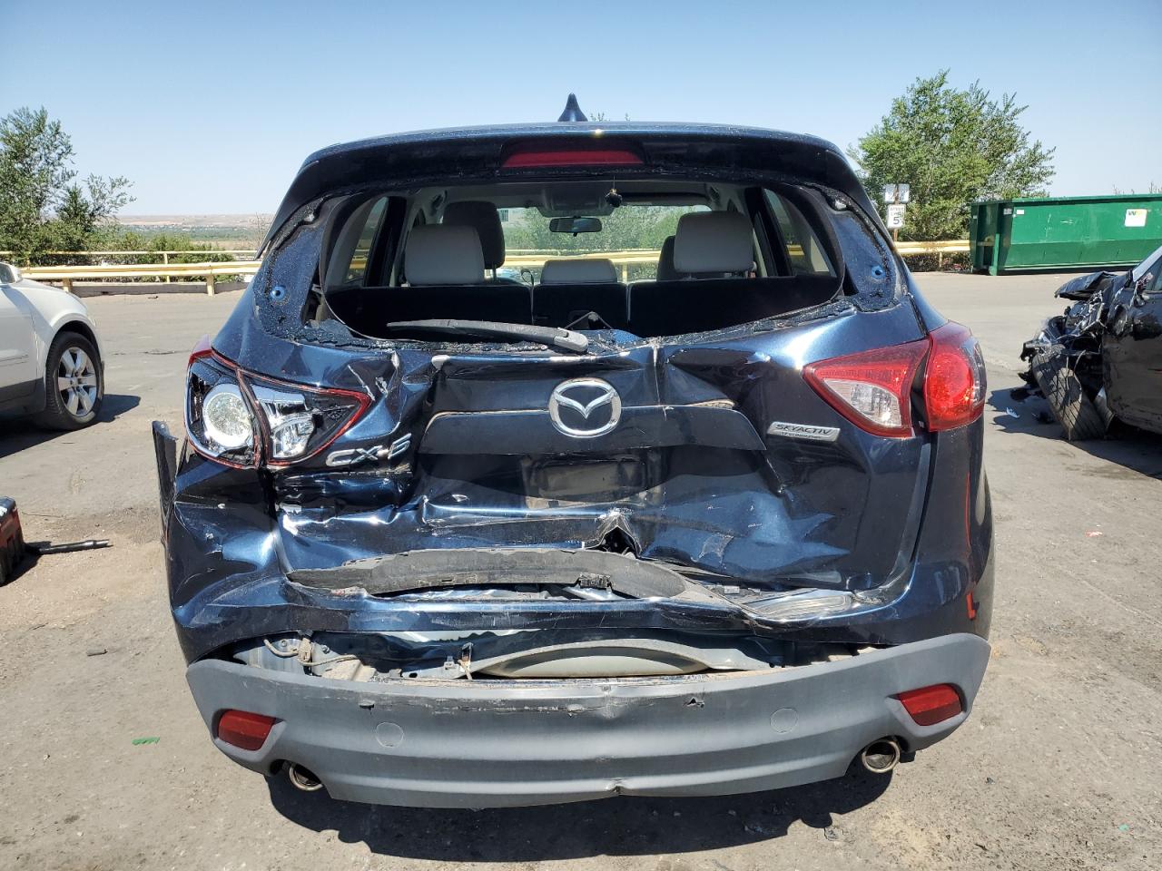 2015 Mazda Cx-5 Touring VIN: JM3KE2CY2F0482414 Lot: 64859405