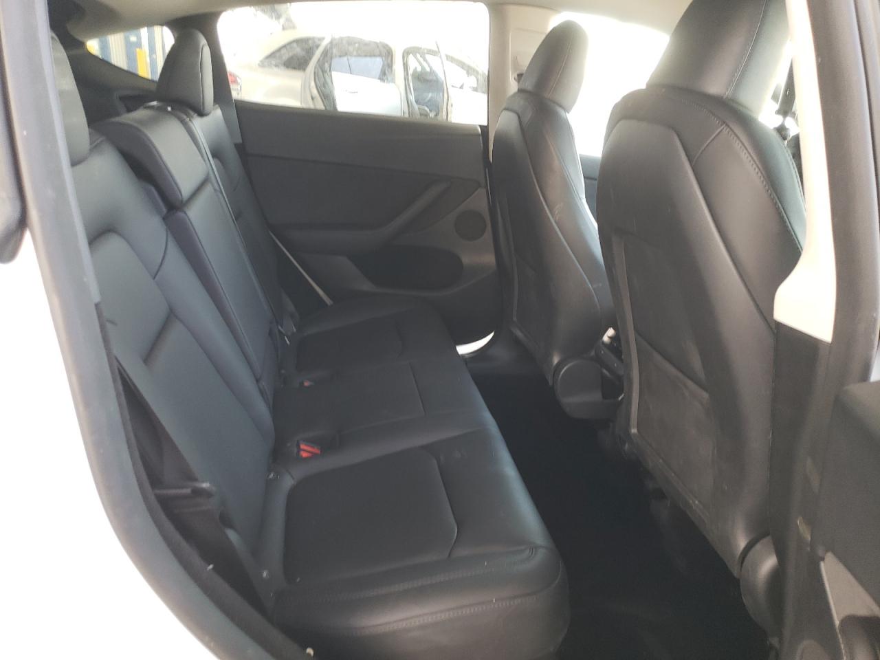 2023 Tesla Model Y VIN: 7SAYGDEE0PF812021 Lot: 64625425