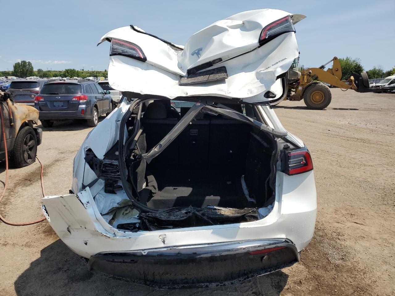 2025 Tesla Model Y VIN: 7SAYGDEE0SF283002 Lot: 62846325