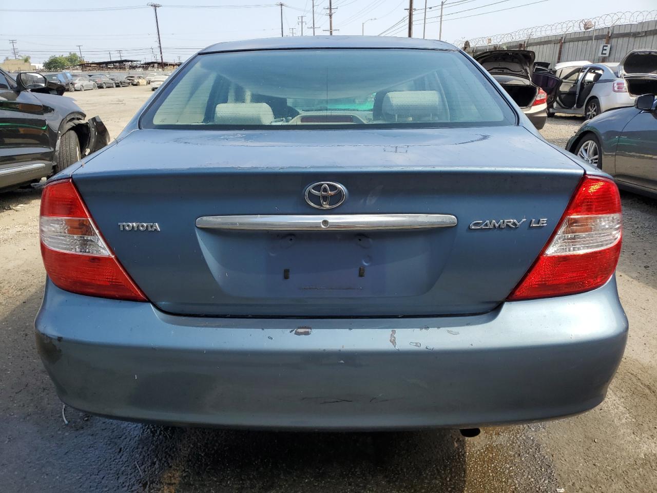 2003 Toyota Camry Le VIN: 4T1BE32KX3U736706 Lot: 64448095