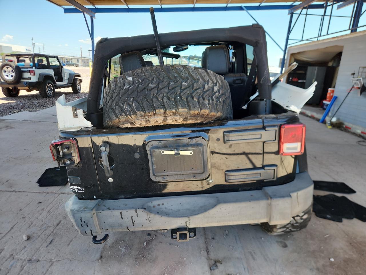 2014 Jeep Wrangler Unlimited Sahara VIN: 1C4BJWEG1EL203726 Lot: 64123135