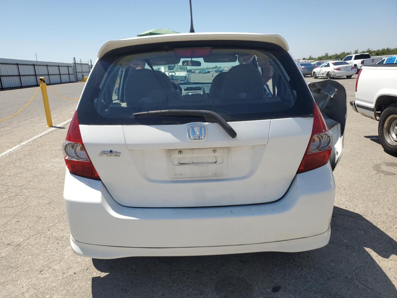 2007 Honda Fit S VIN: JHMGD38687S009877 Lot: 64985315