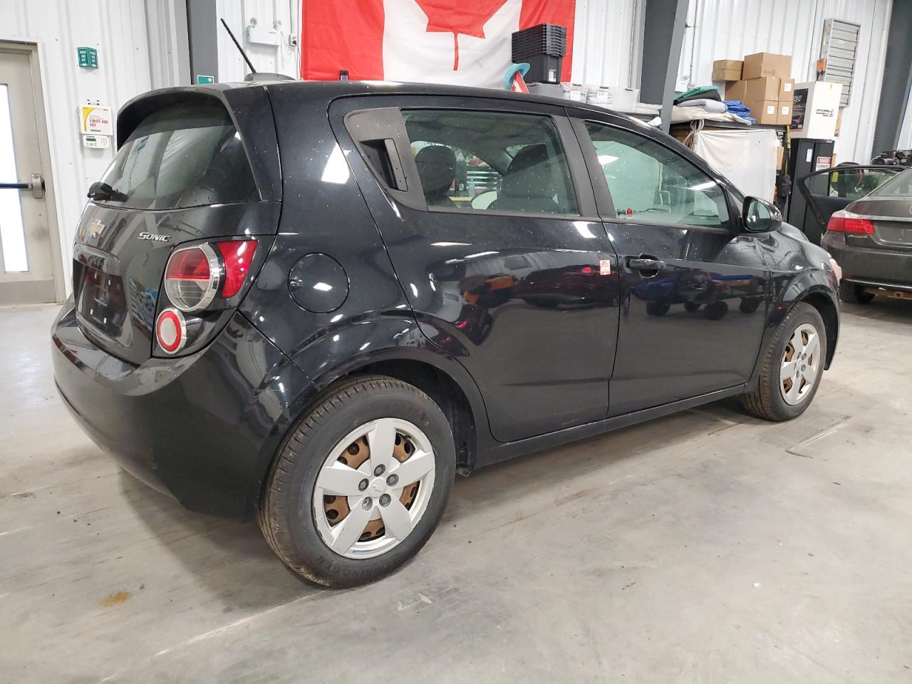2015 Chevrolet Sonic Ls VIN: 1G1JA6SH0F4121144 Lot: 63904575