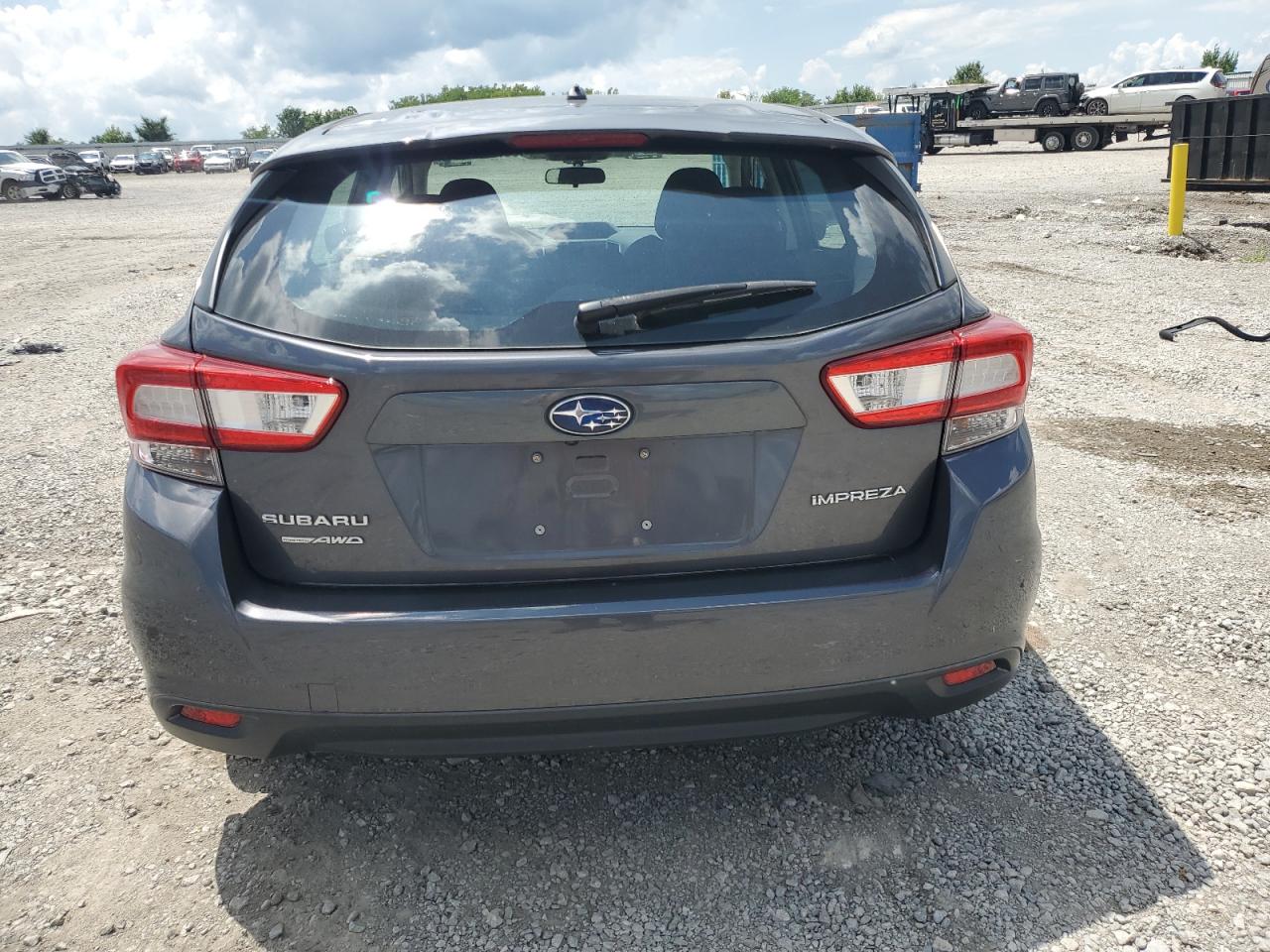 2019 Subaru Impreza VIN: 4S3GTAA61K3718009 Lot: 63789475