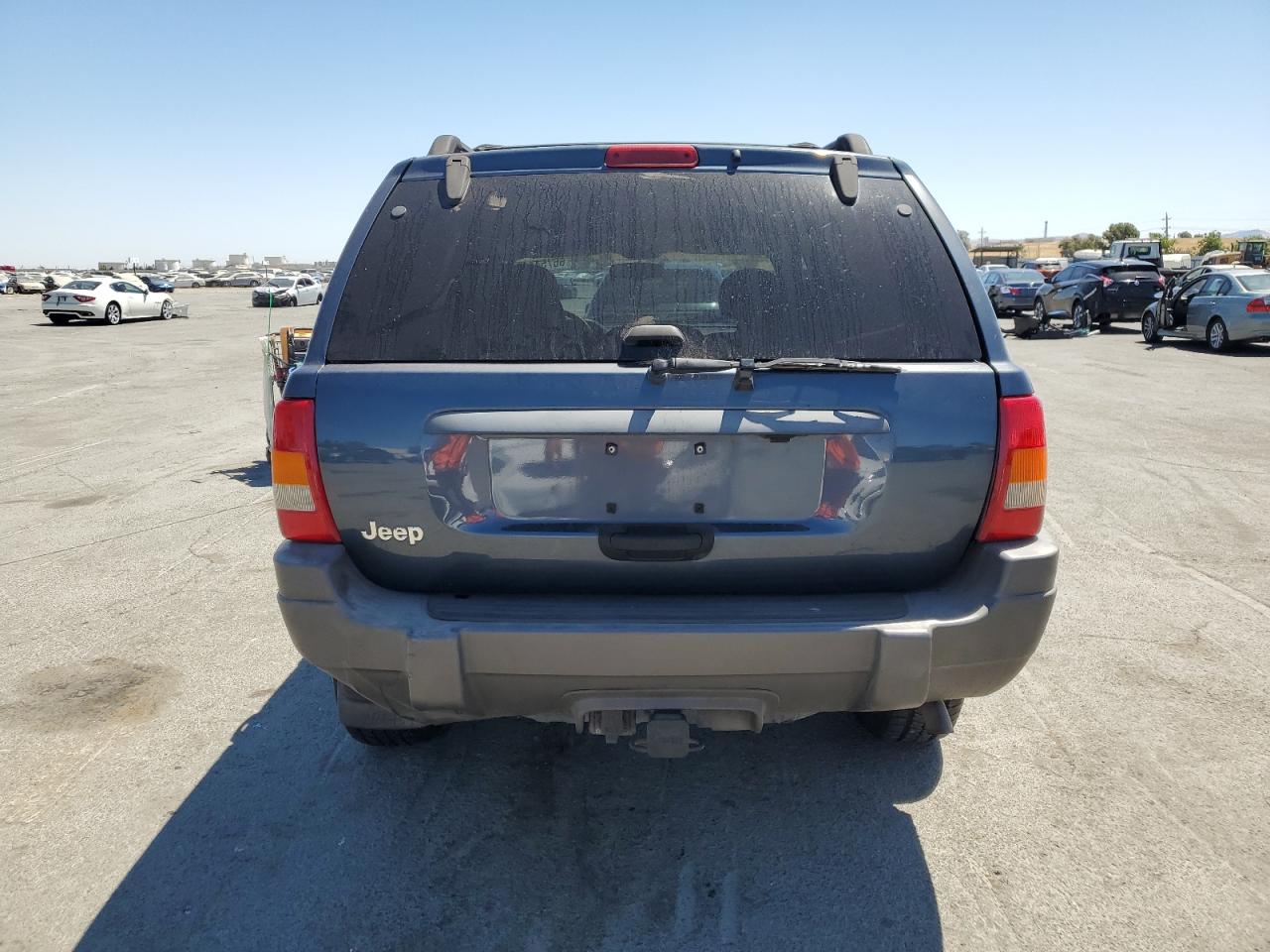 2001 Jeep Grand Cherokee Laredo VIN: 1J4GW48S01C704008 Lot: 66754445