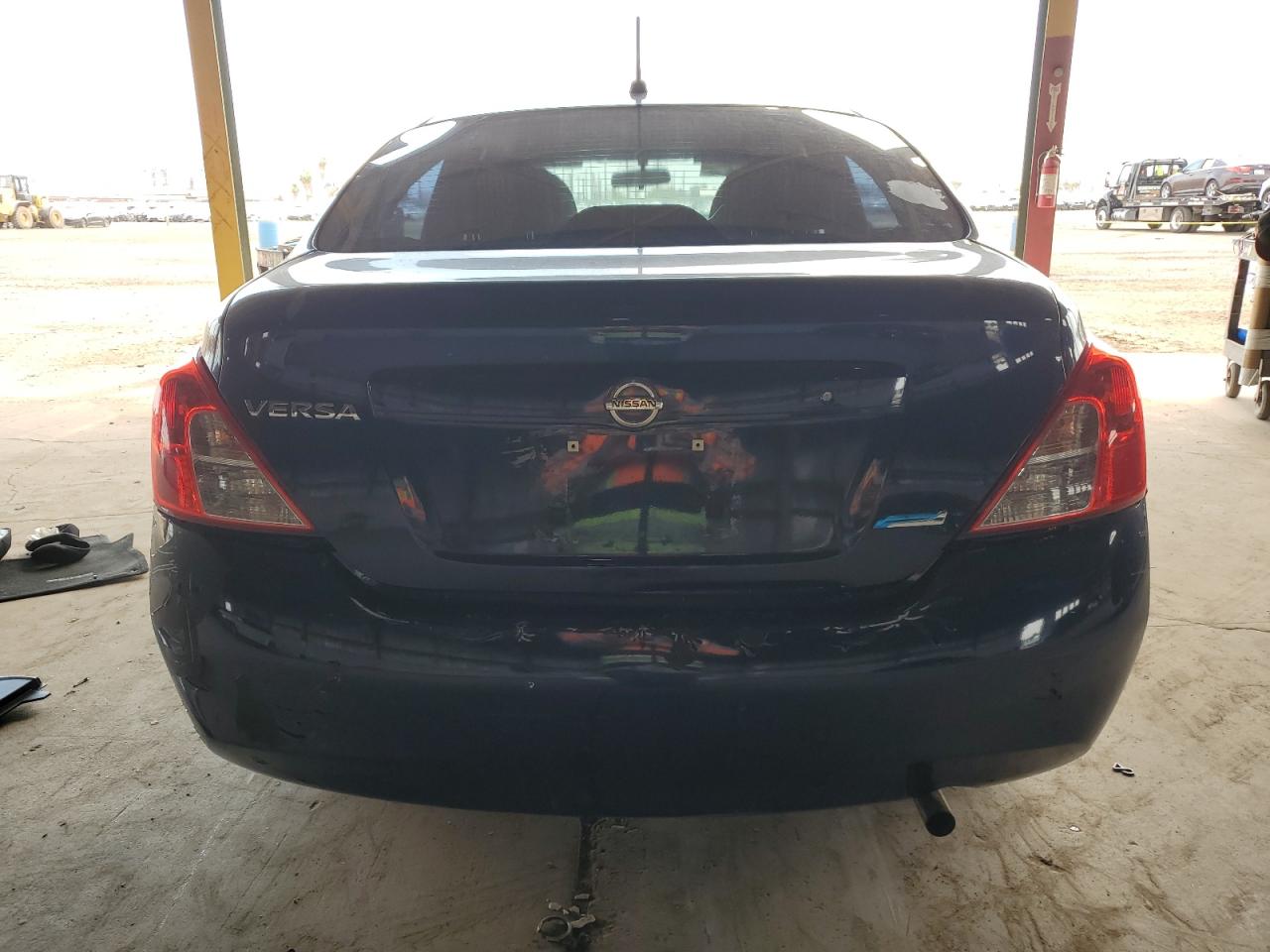 2014 Nissan Versa S VIN: 3N1CN7AP7EL869209 Lot: 64506875