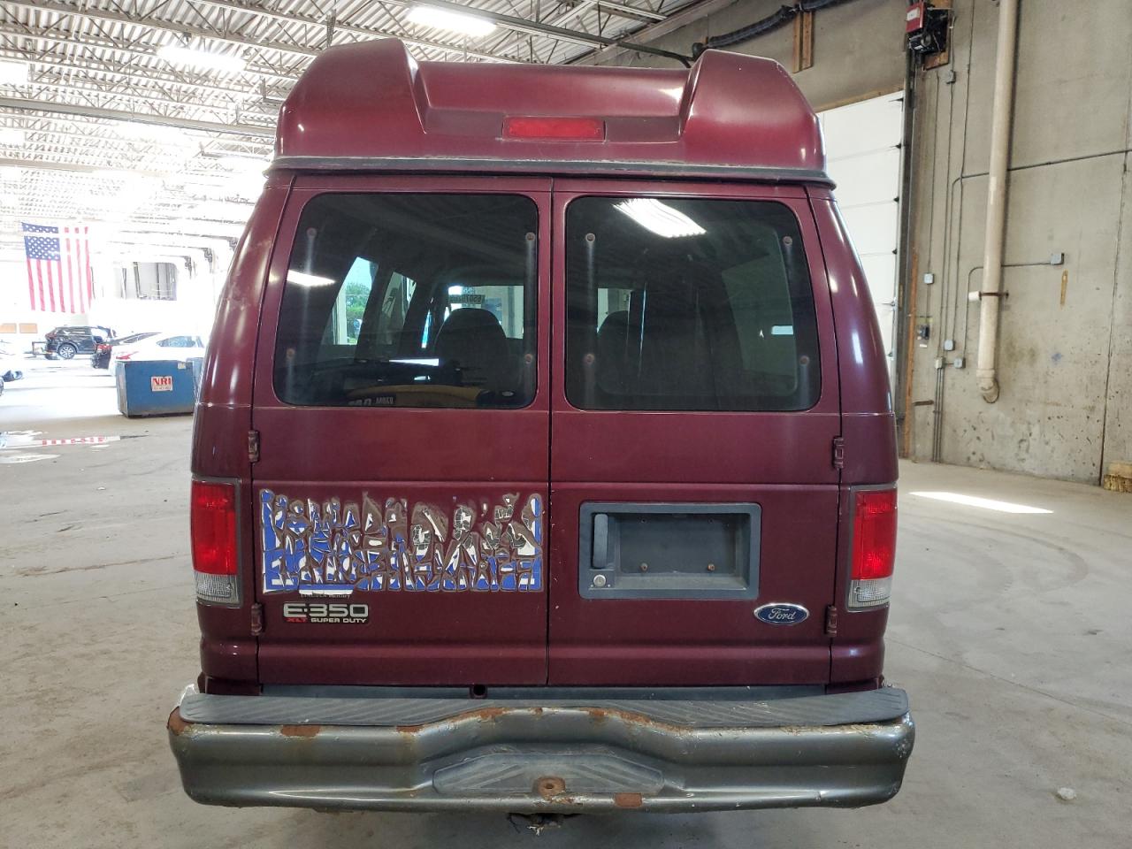 2004 Ford Econoline E350 Super Duty Wagon VIN: 1FBSS31L04HA57873 Lot: 65079265