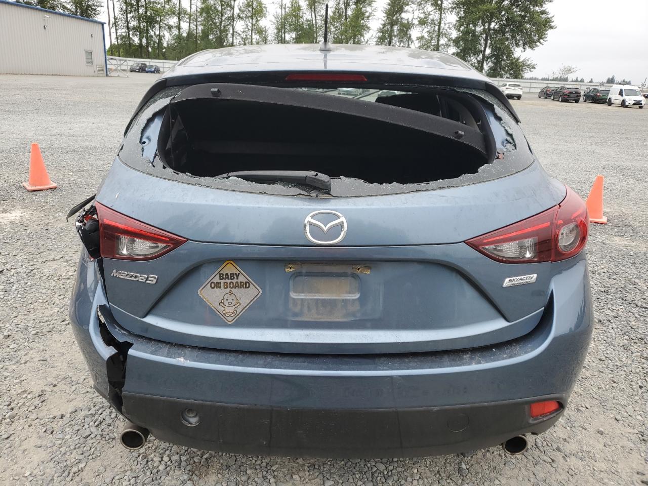 2014 Mazda 3 Touring VIN: JM1BM1L70E1217058 Lot: 63783295