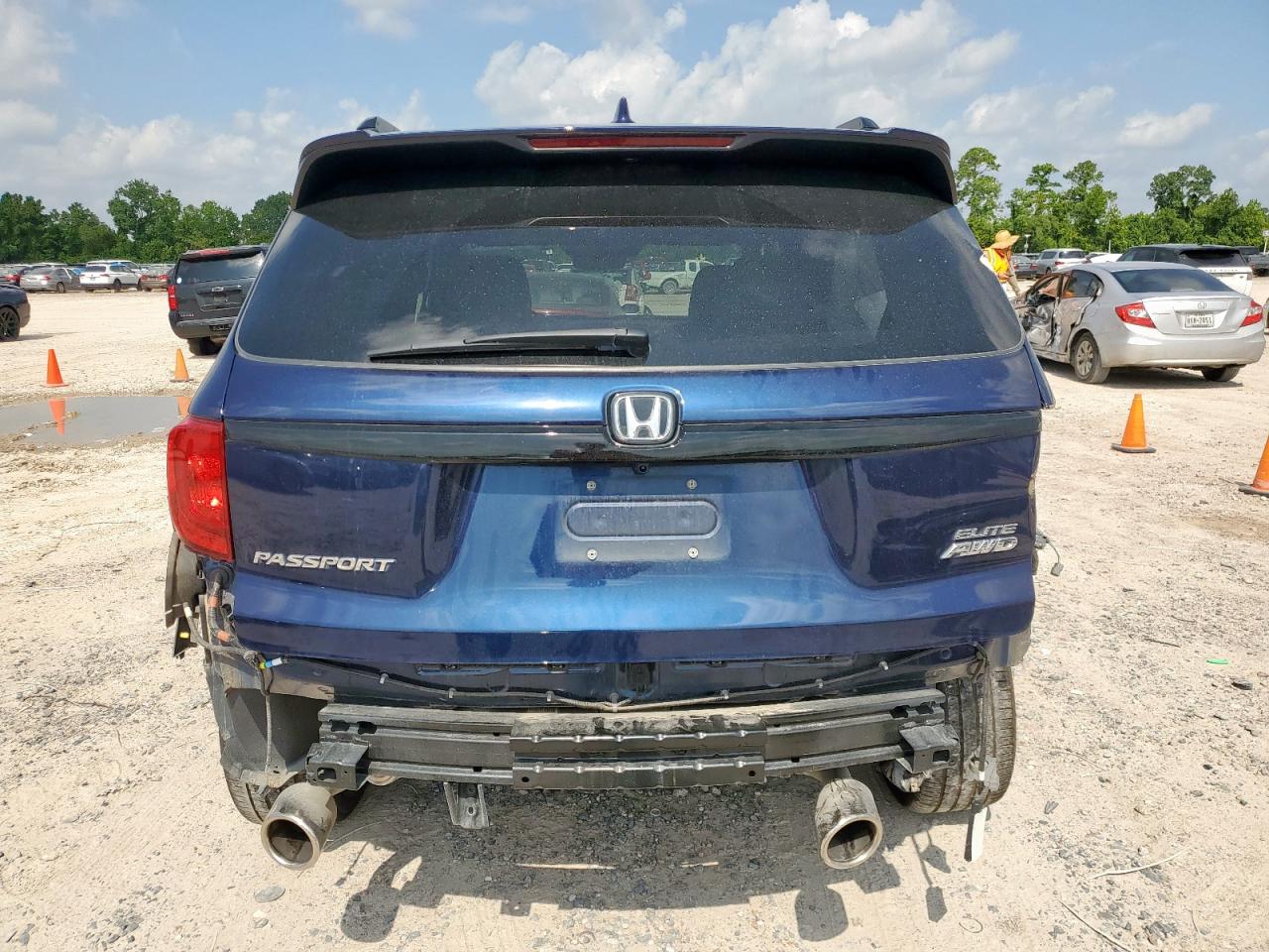 2023 Honda Passport Elite VIN: 5FNYF8H04PB026424 Lot: 65095545