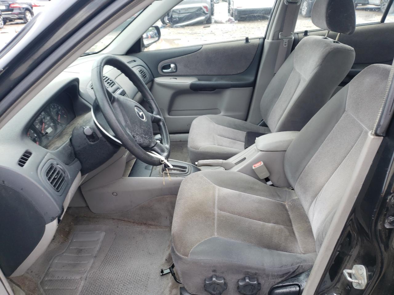 2001 Mazda Protege Dx VIN: JM1BJ222010414736 Lot: 65020415