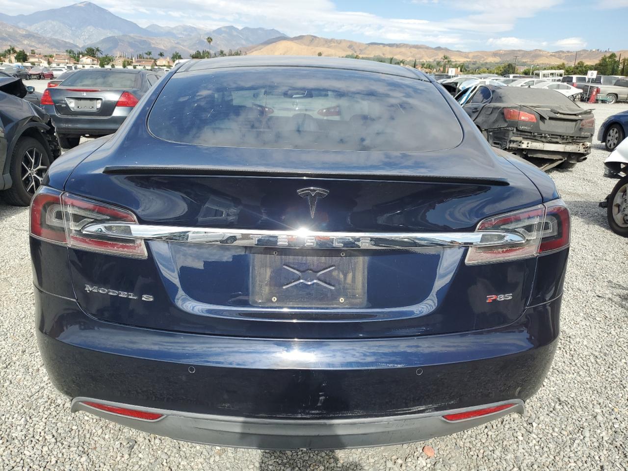 2014 Tesla Model S VIN: 5YJSA1H19EFP57304 Lot: 63802355