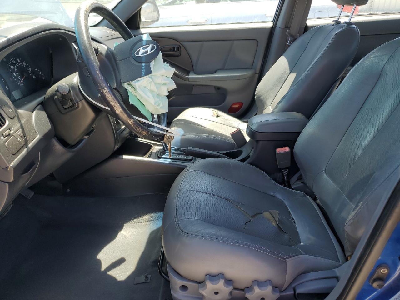 2004 Hyundai Elantra Gls VIN: KMHDN56D24U104882 Lot: 64136915