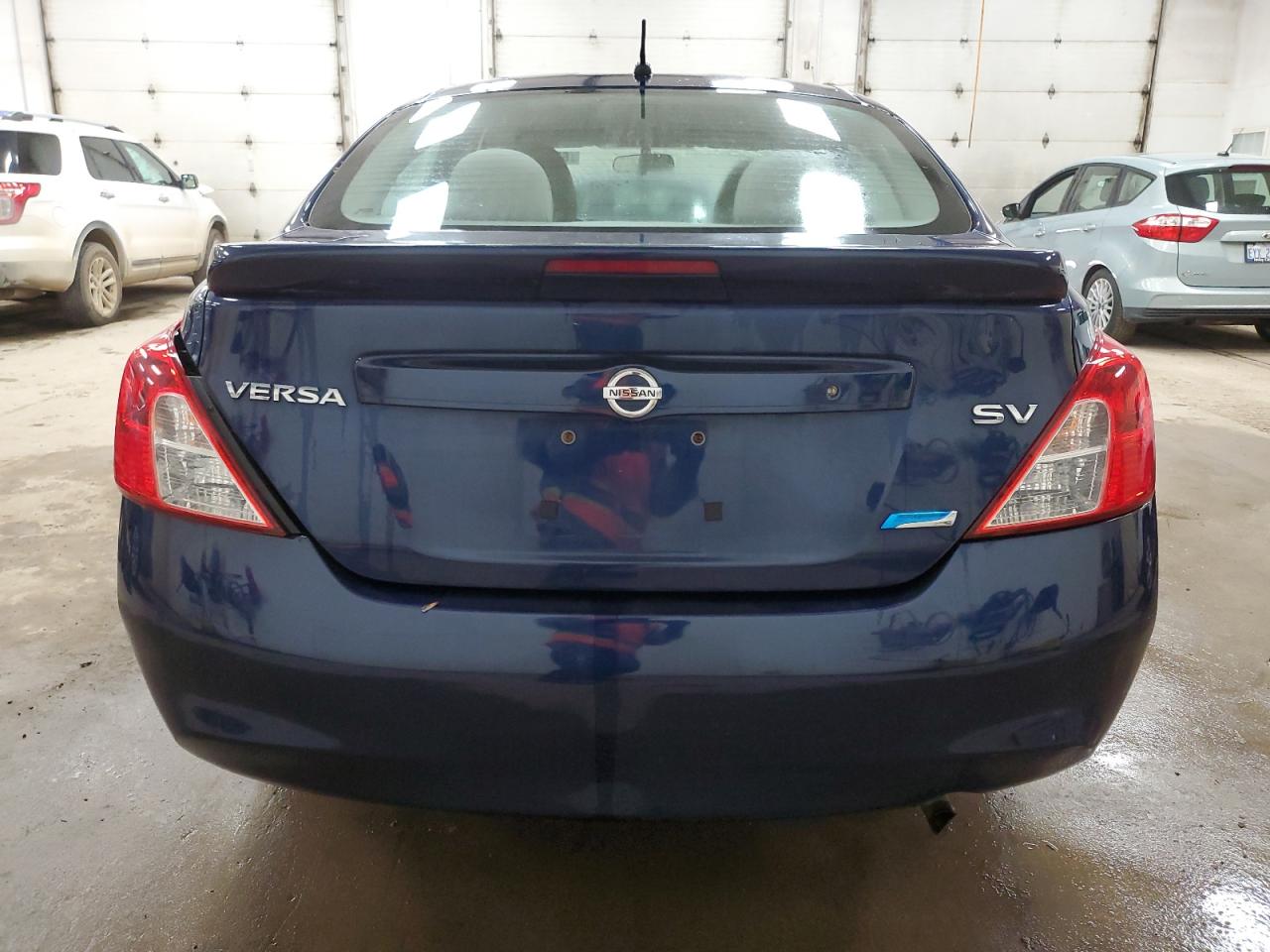 2014 Nissan Versa S VIN: 3N1CN7AP0EL876034 Lot: 63688575