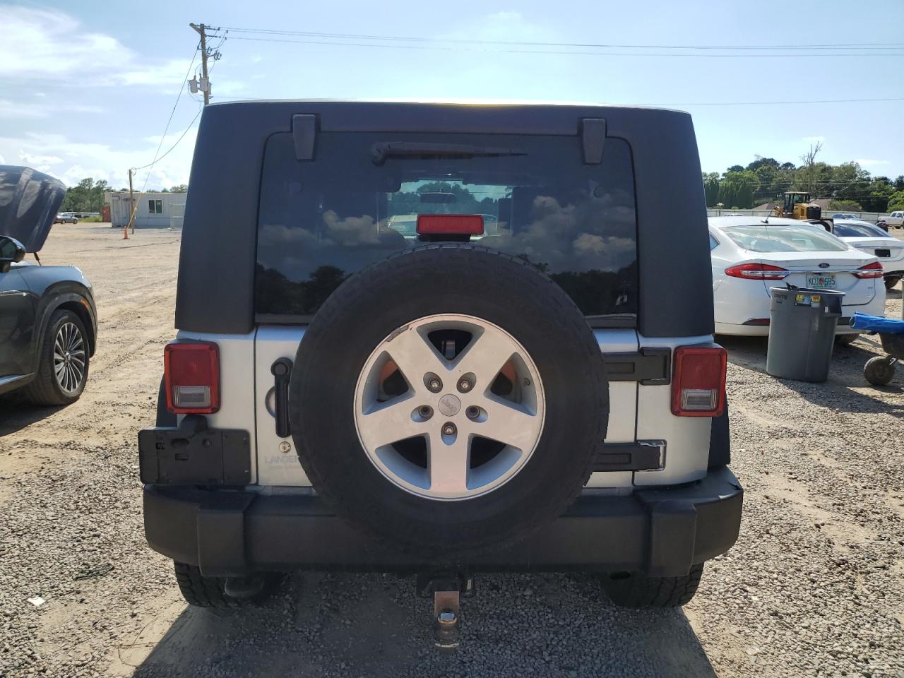 2010 Jeep Wrangler Unlimited Sport VIN: 1J4BA3H12AL124611 Lot: 63663475