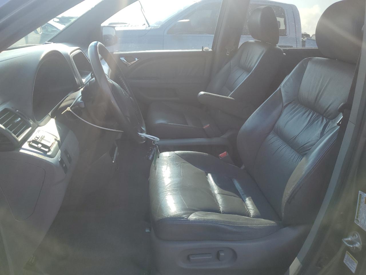 2010 Honda Odyssey Exl VIN: 5FNRL3H71AB106915 Lot: 64417765