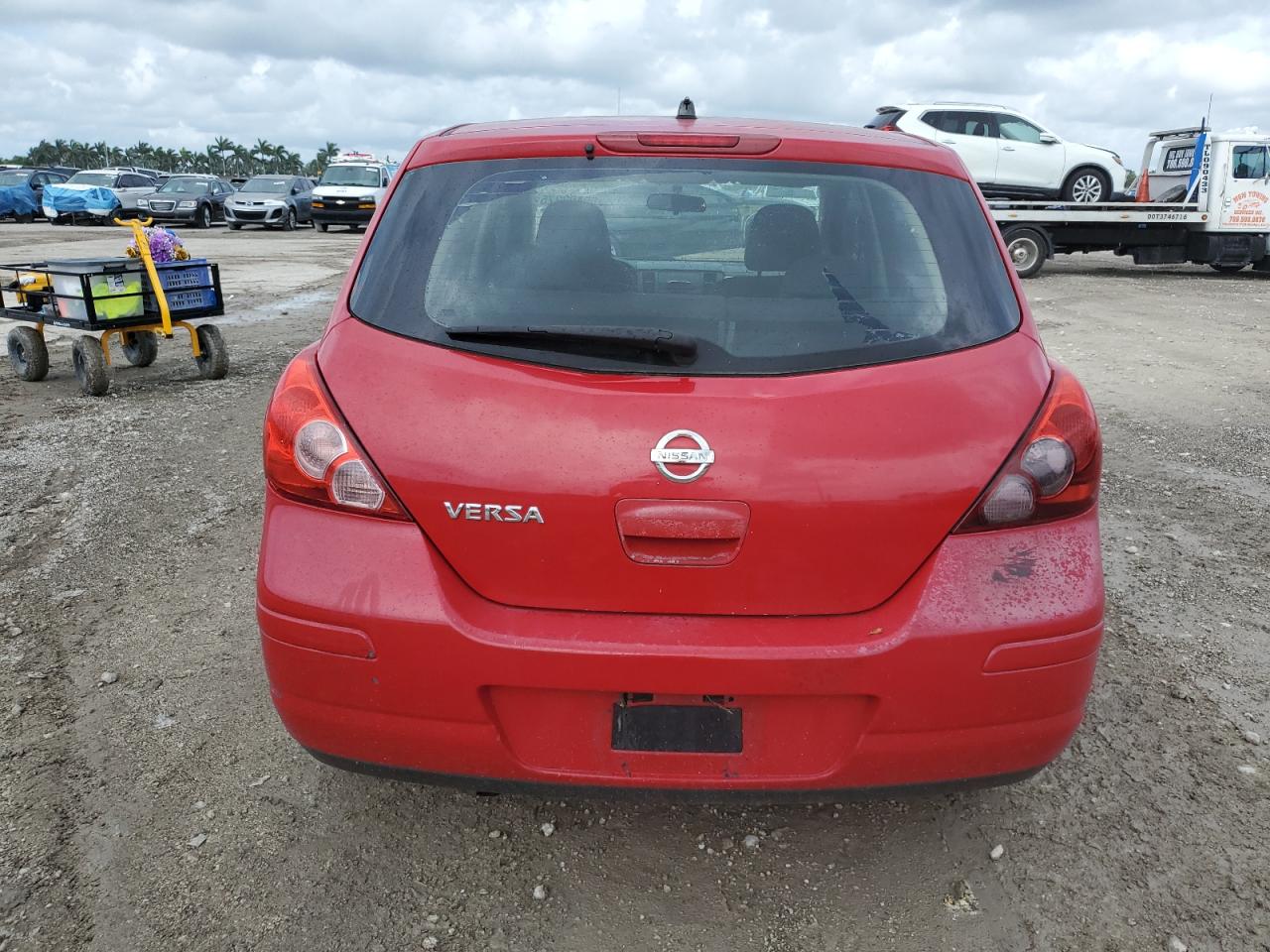 2009 Nissan Versa S VIN: 3N1BC13E79L404736 Lot: 65402275