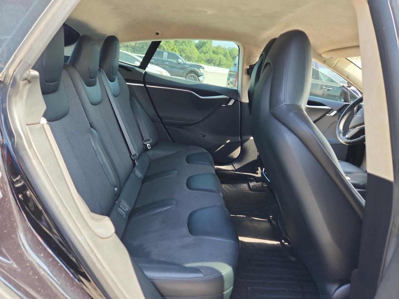 2015 Tesla Model S VIN: 5YJSA1E14FF102828 Lot: 64842295