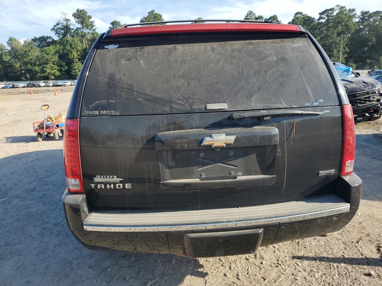 2010 Chevrolet Tahoe C1500 Ltz VIN: 1GNUCCE09AR107569 Lot: 64991365