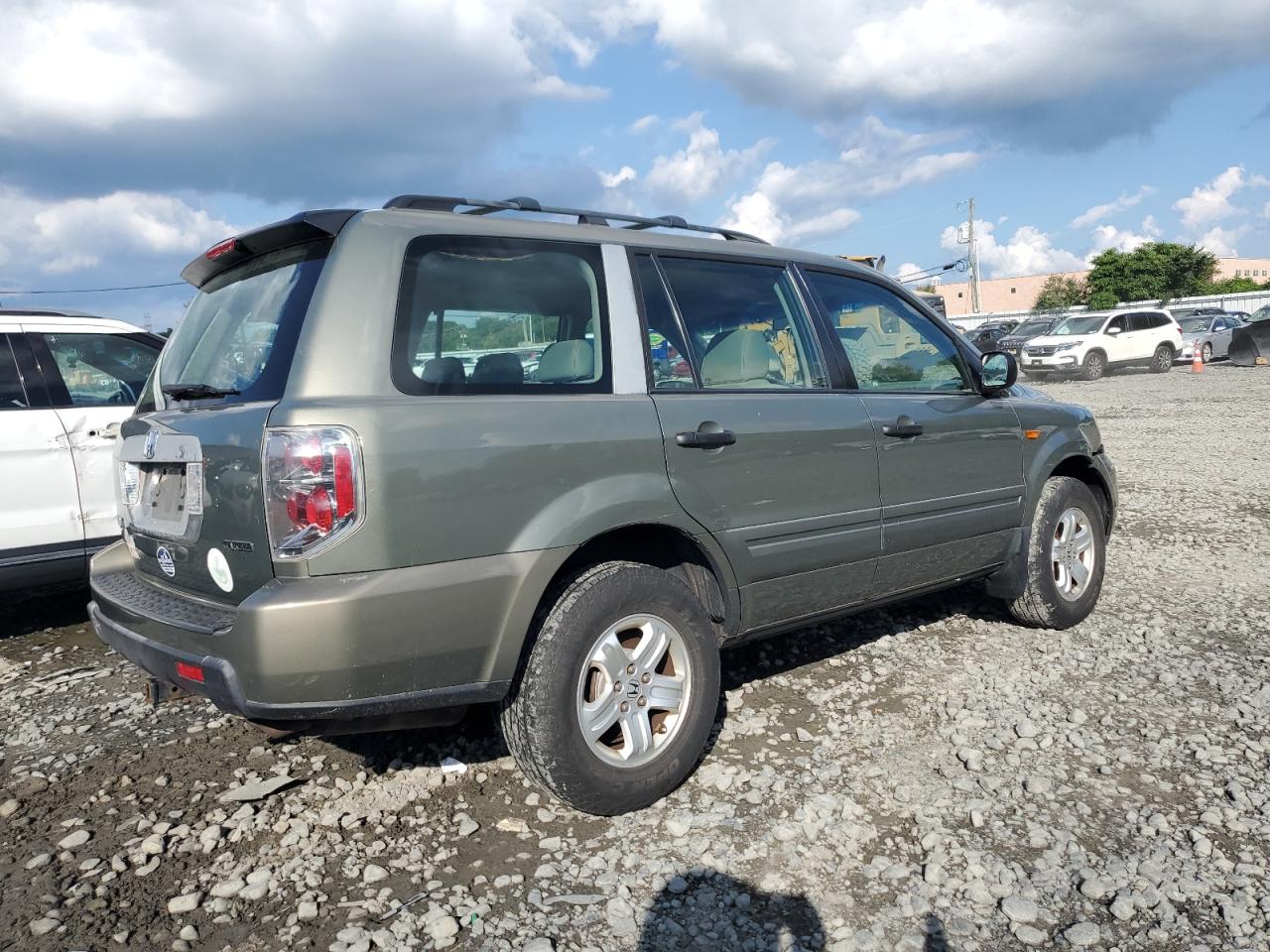 2007 Honda Pilot Lx VIN: 5FNYF18137B029704 Lot: 64726575