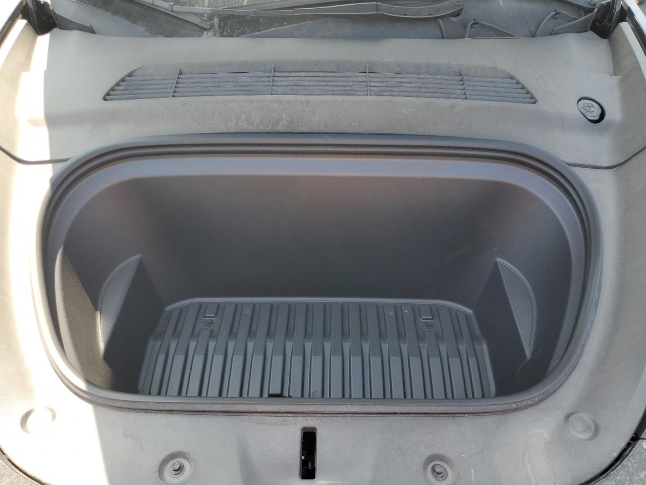 2023 Tesla Model Y VIN: 7SAYGAEE6PF796339 Lot: 63155255
