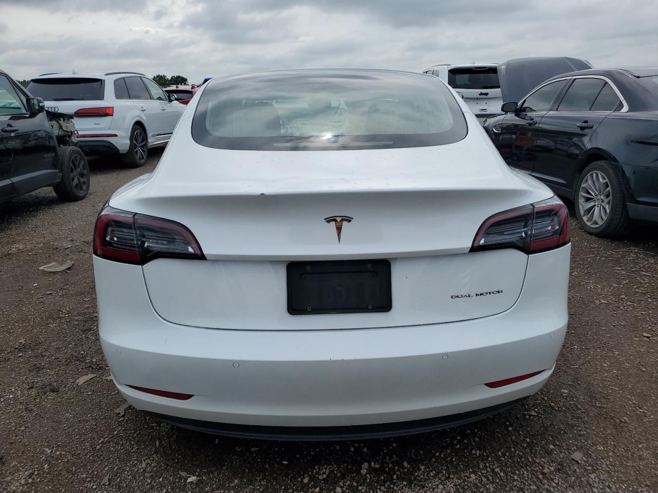2020 Tesla Model 3 VIN: 5YJ3E1EB1LF621073 Lot: 63772435