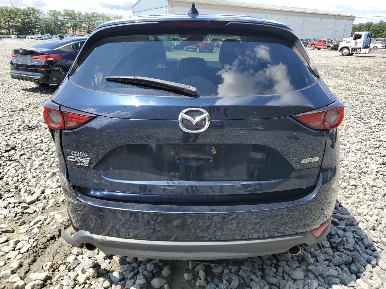 2018 Mazda Cx-5 Grand Touring VIN: JM3KFBDM7J0328704 Lot: 64746495