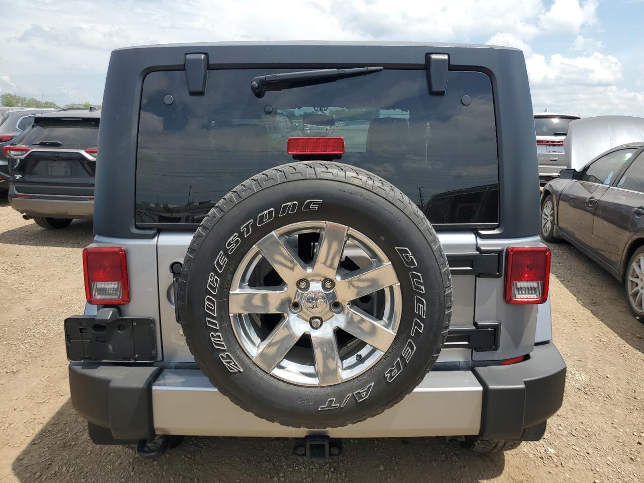 2016 Jeep Wrangler Sahara VIN: 1C4GJWBG9GL100518 Lot: 64752405