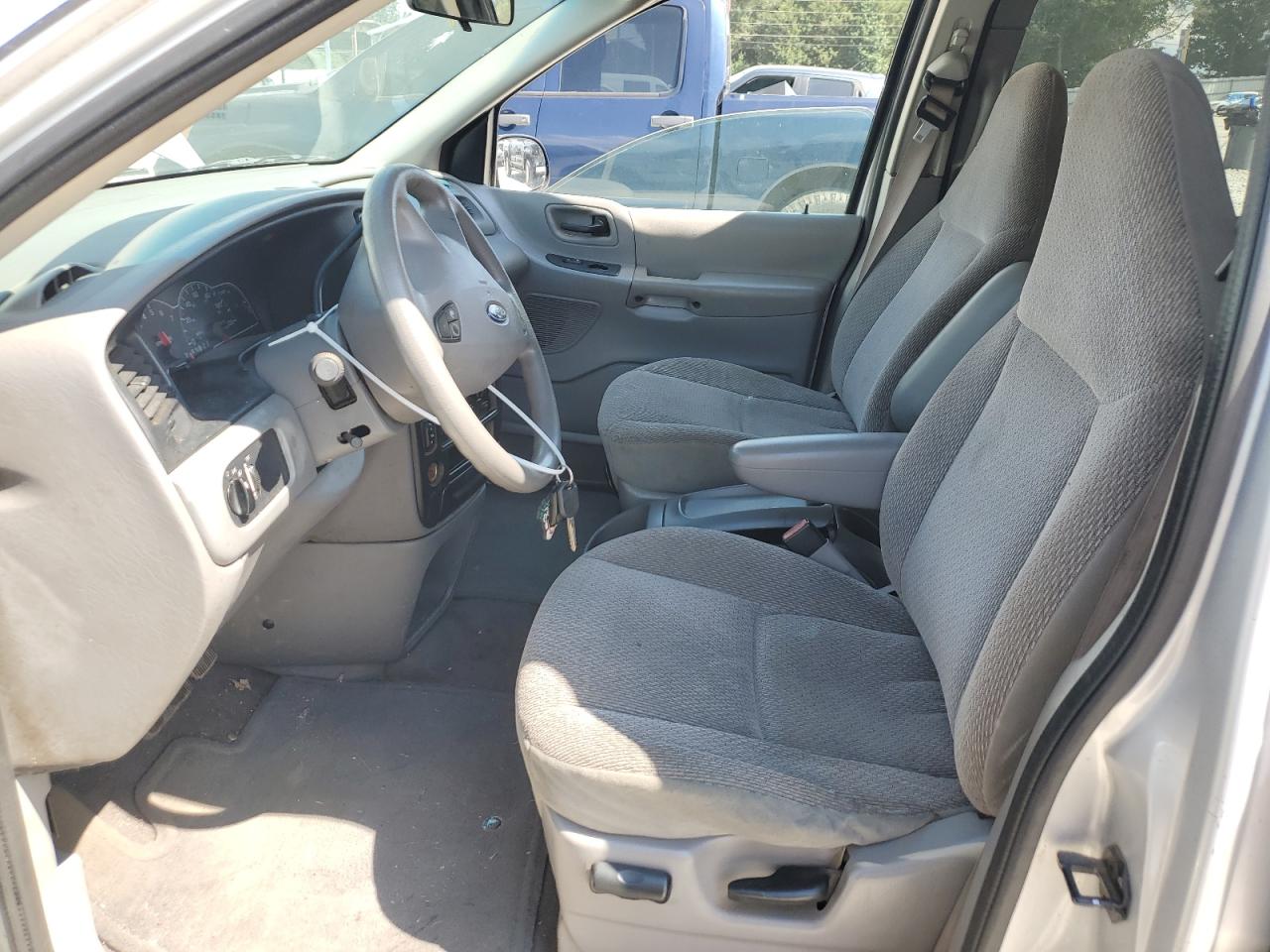 2003 Ford Windstar Lx VIN: 2FMZA51403BA77386 Lot: 66694145