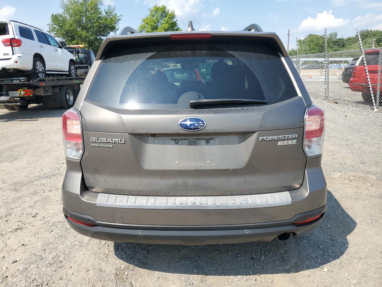 2017 Subaru Forester 2.5I Touring VIN: JF2SJAWC2HH558055 Lot: 65933405