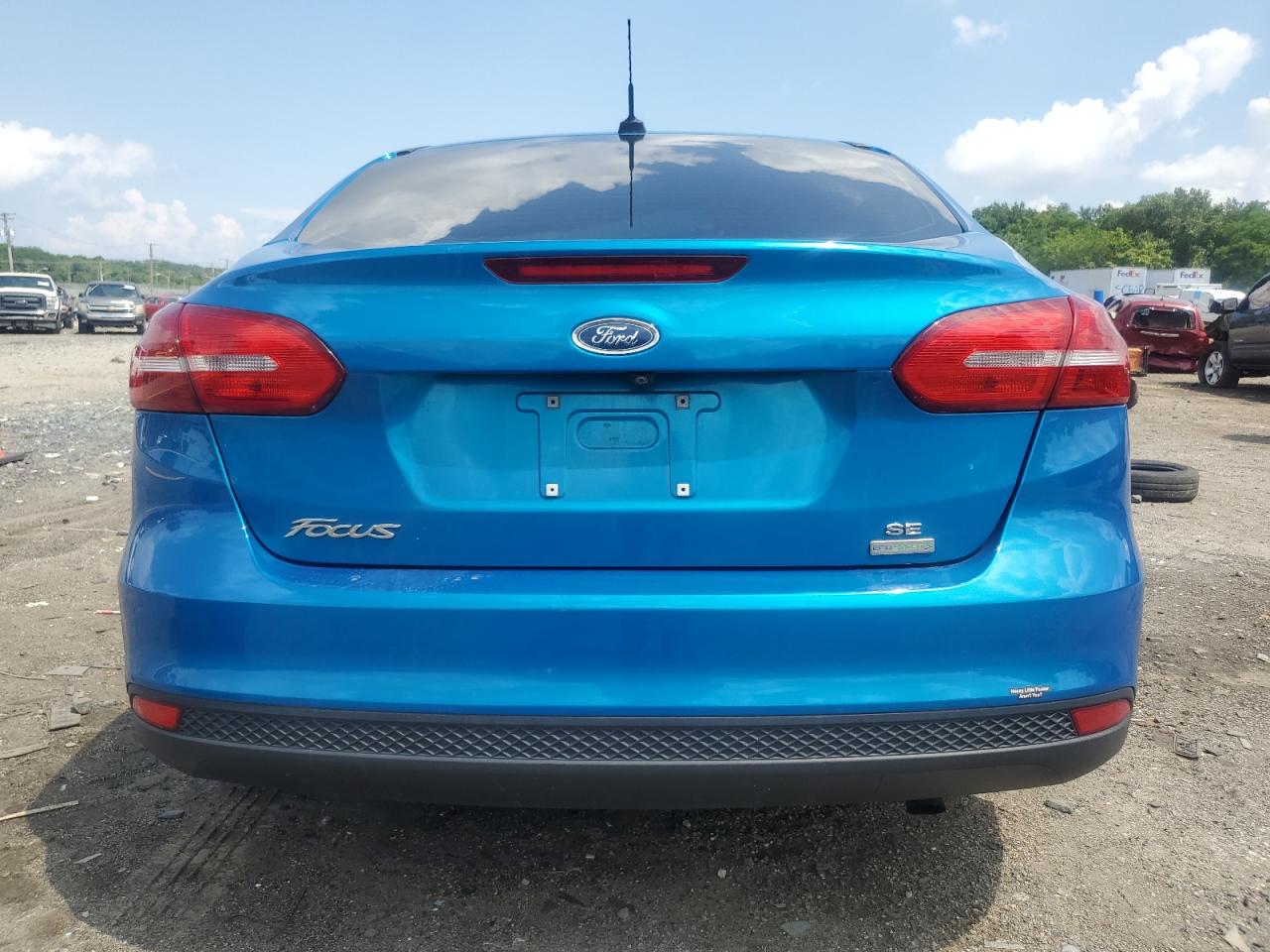 2016 Ford Focus Se VIN: 1FADP3FE4GL238420 Lot: 64782595