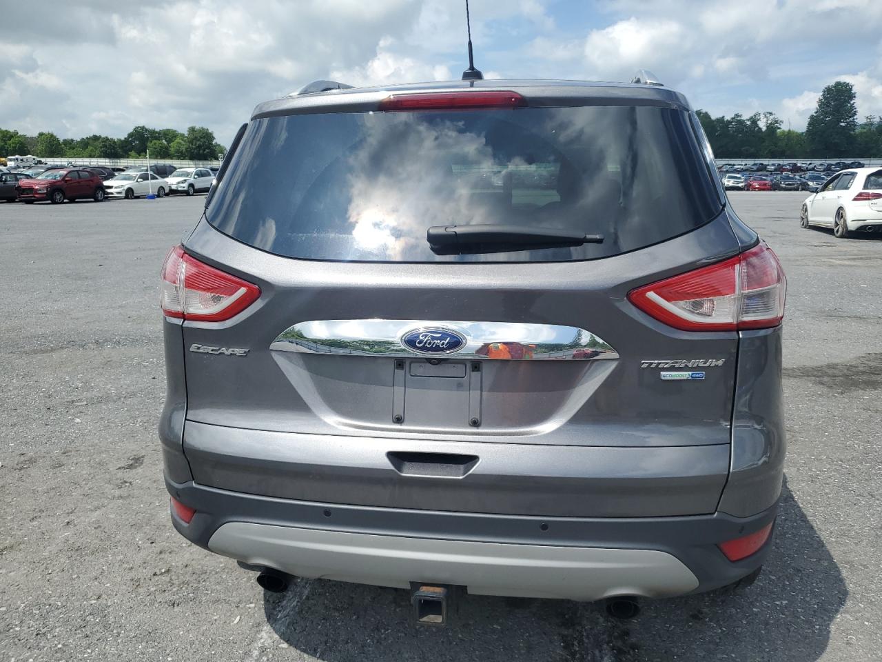 2014 Ford Escape Titanium VIN: 1FMCU9J91EUA57435 Lot: 63530105