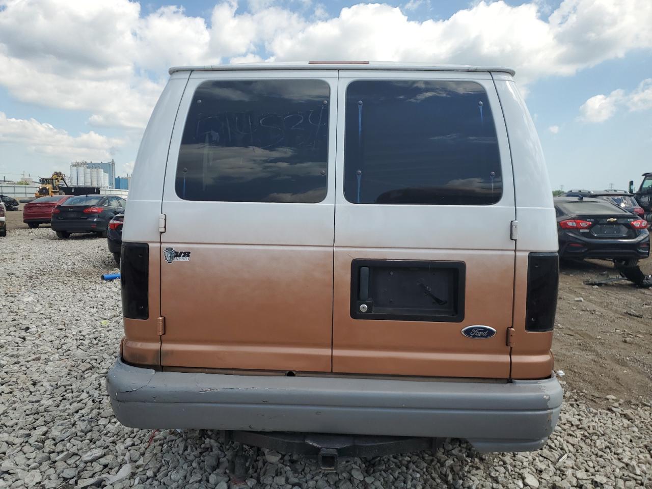 2003 Ford Econoline E150 Van VIN: 1FDRE14L23HA05933 Lot: 63083205