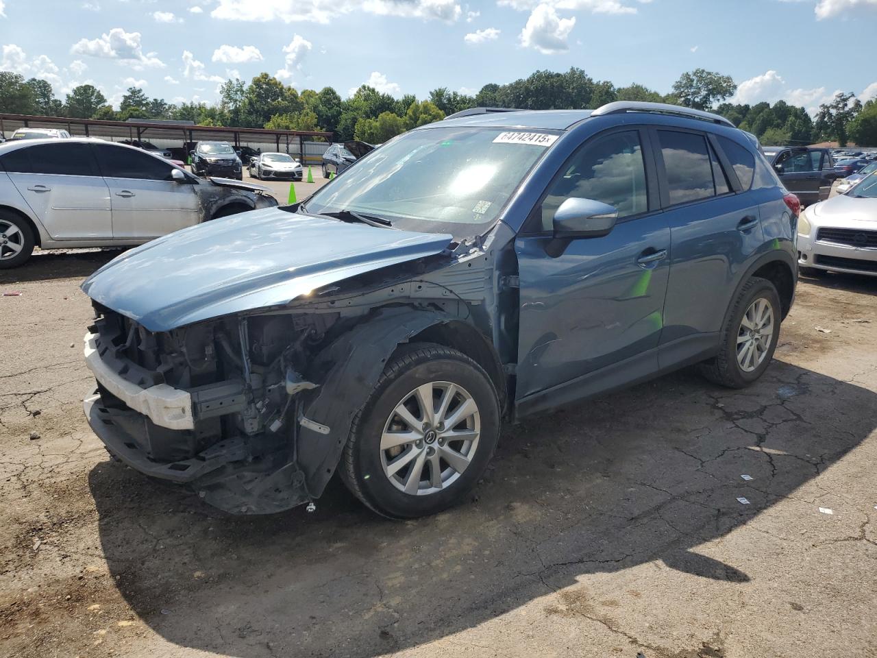 2015 Mazda Cx-5 Touring VIN: JM3KE2CY4F0515171 Lot: 64742415