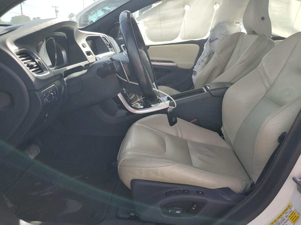 2015 Volvo S60 Premier VIN: YV140MFB4F1304818 Lot: 64573135