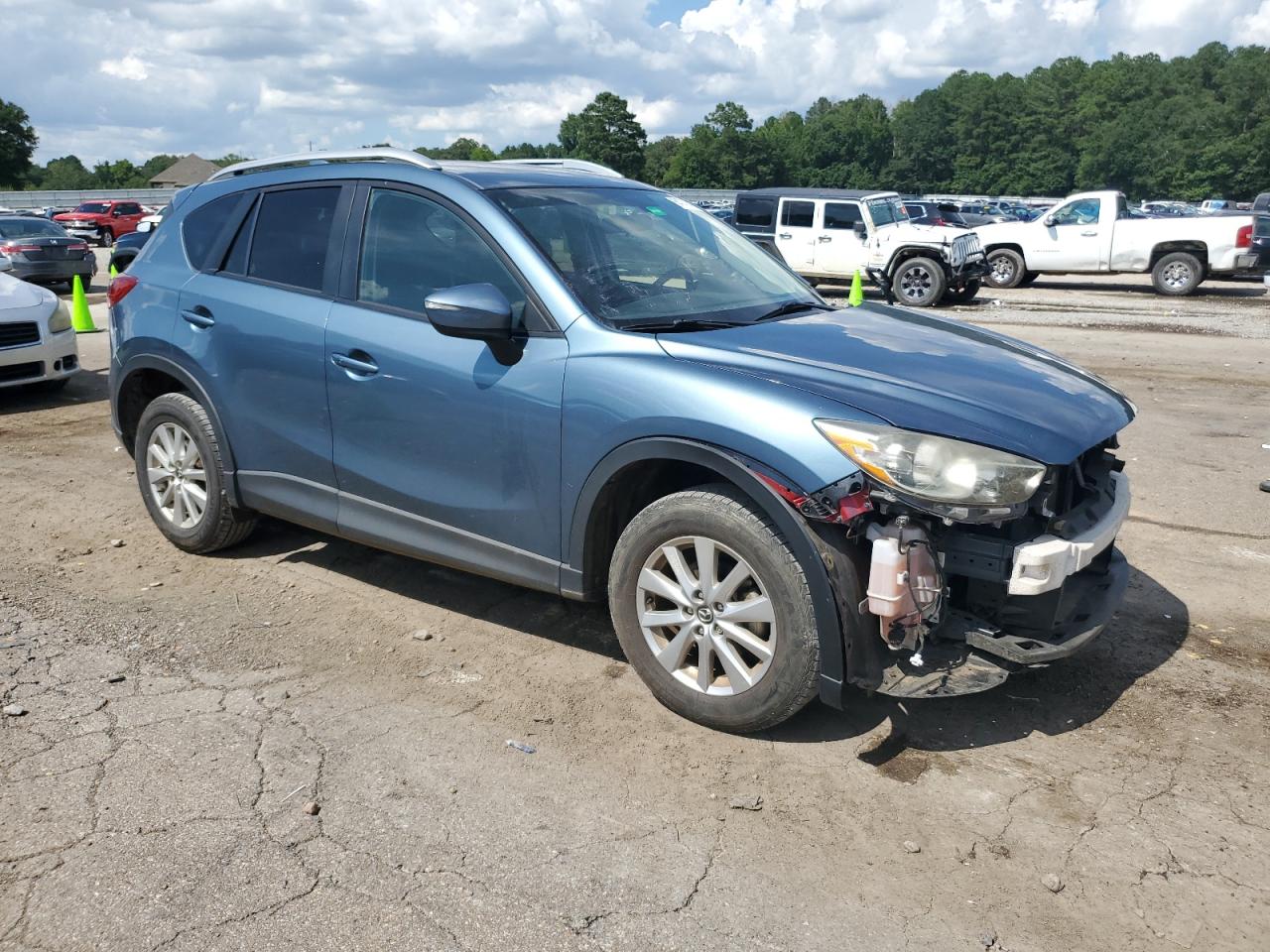 2015 Mazda Cx-5 Touring VIN: JM3KE2CY4F0515171 Lot: 64742415