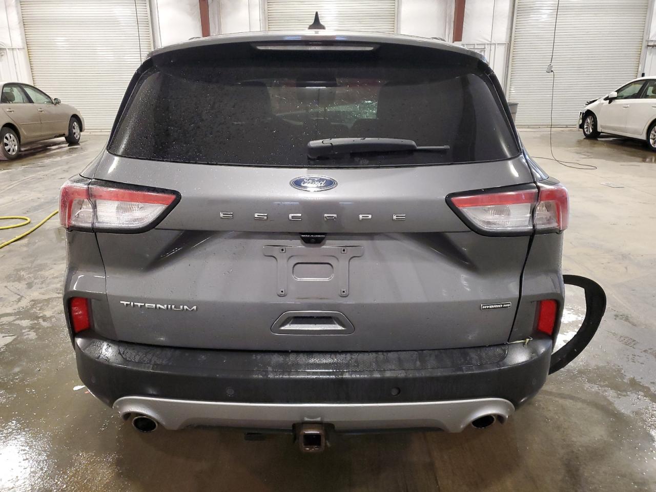 2021 Ford Escape Titanium VIN: 1FMCU9DZ7MUA70281 Lot: 64196395