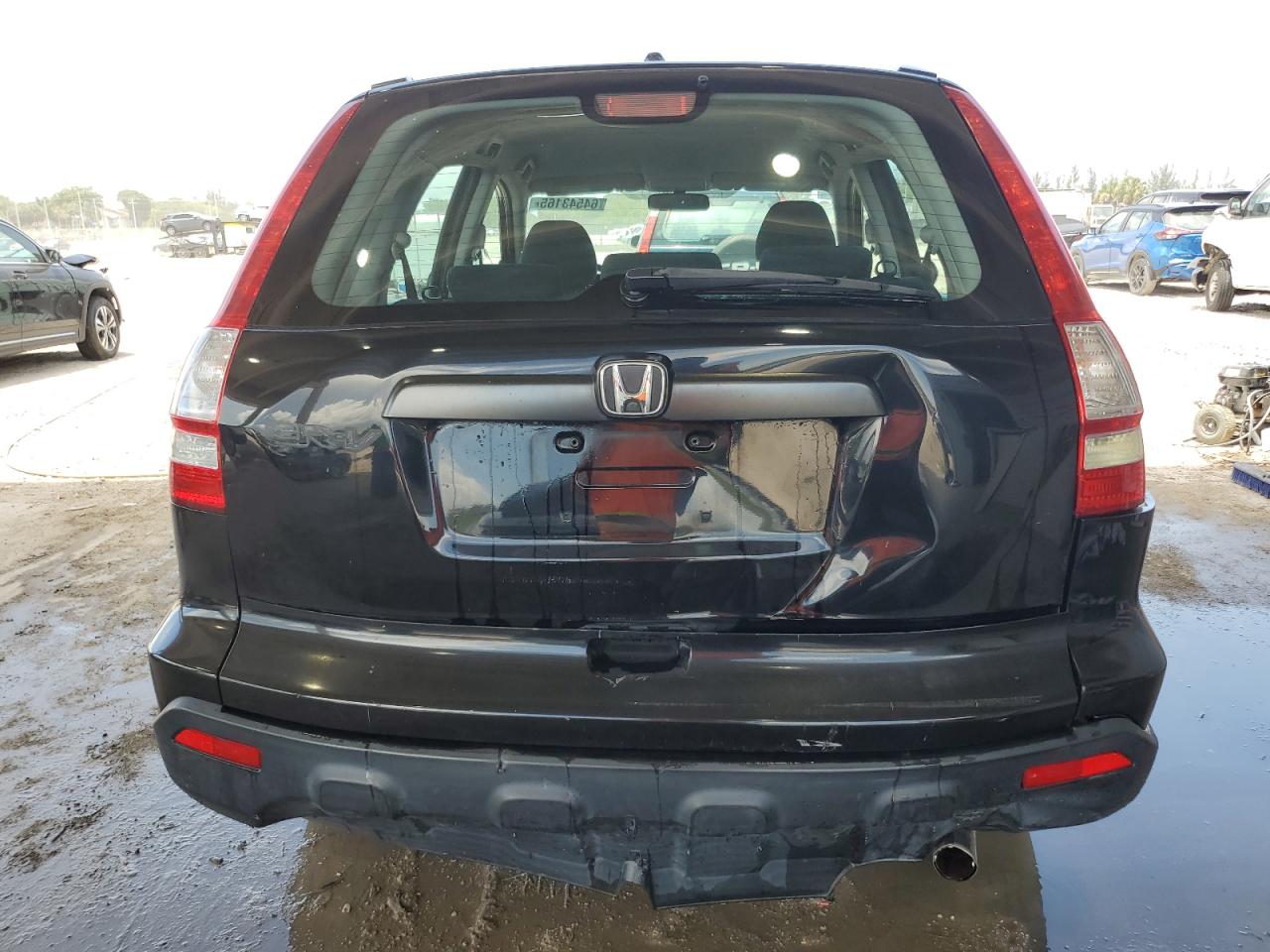 2009 Honda Cr-V Lx VIN: 3CZRE38329G700520 Lot: 64543165