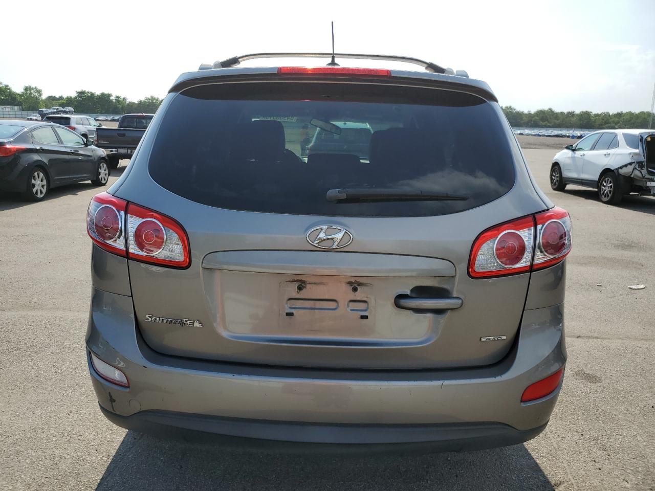 2012 Hyundai Santa Fe Se VIN: 5XYZHDAG0CG109592 Lot: 64953515