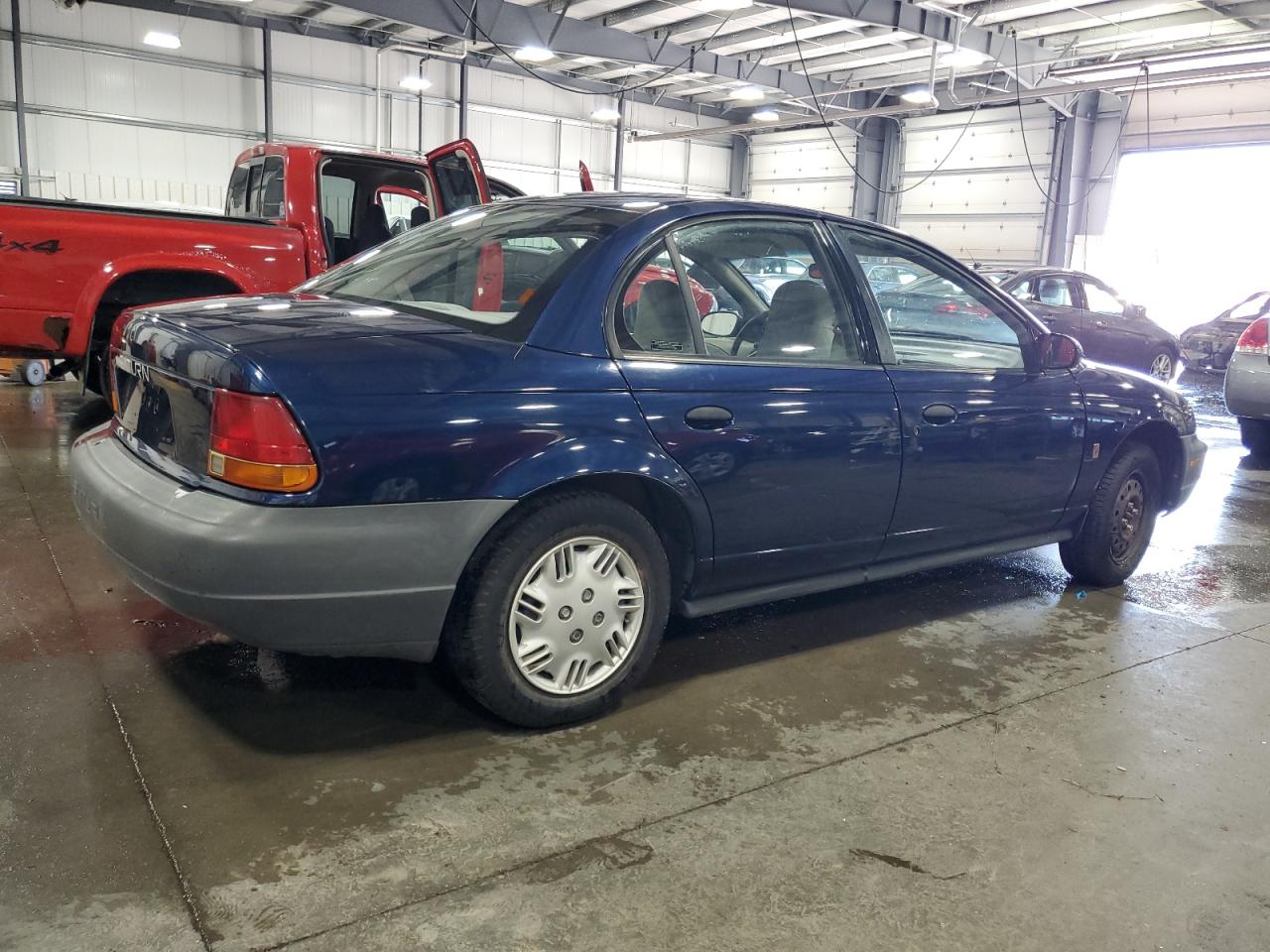 1999 Saturn Sl1 VIN: 1G8ZG5281XZ329776 Lot: 63295095