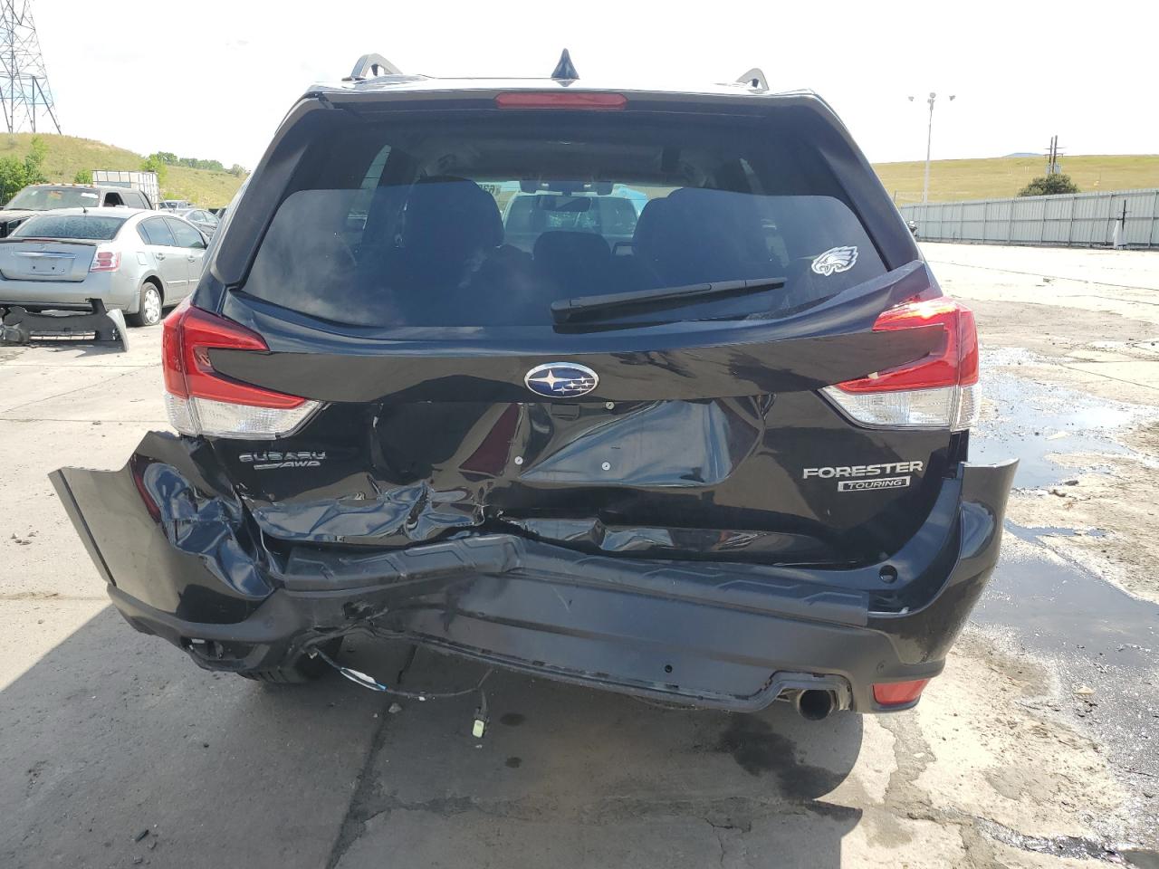 2021 Subaru Forester Touring VIN: JF2SKAXC9MH520571 Lot: 63043505