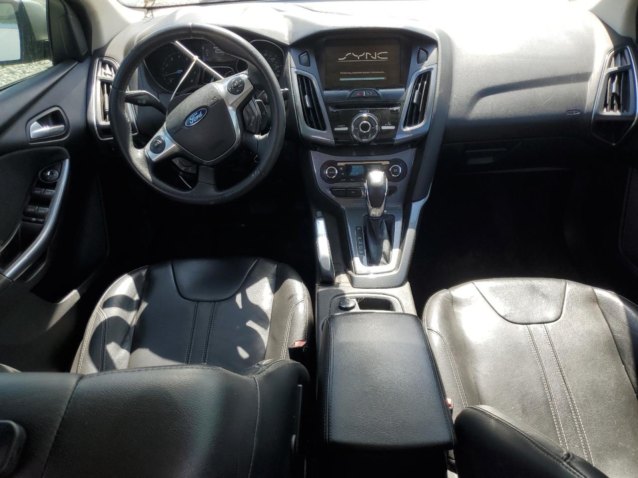 2012 Ford Focus Titanium VIN: 1FAHP3J25CL213938 Lot: 65078405