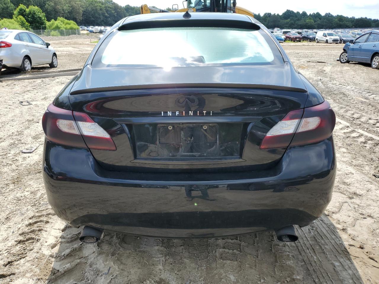 2012 Infiniti M35H VIN: JN1EY1APXCM910402 Lot: 63177875