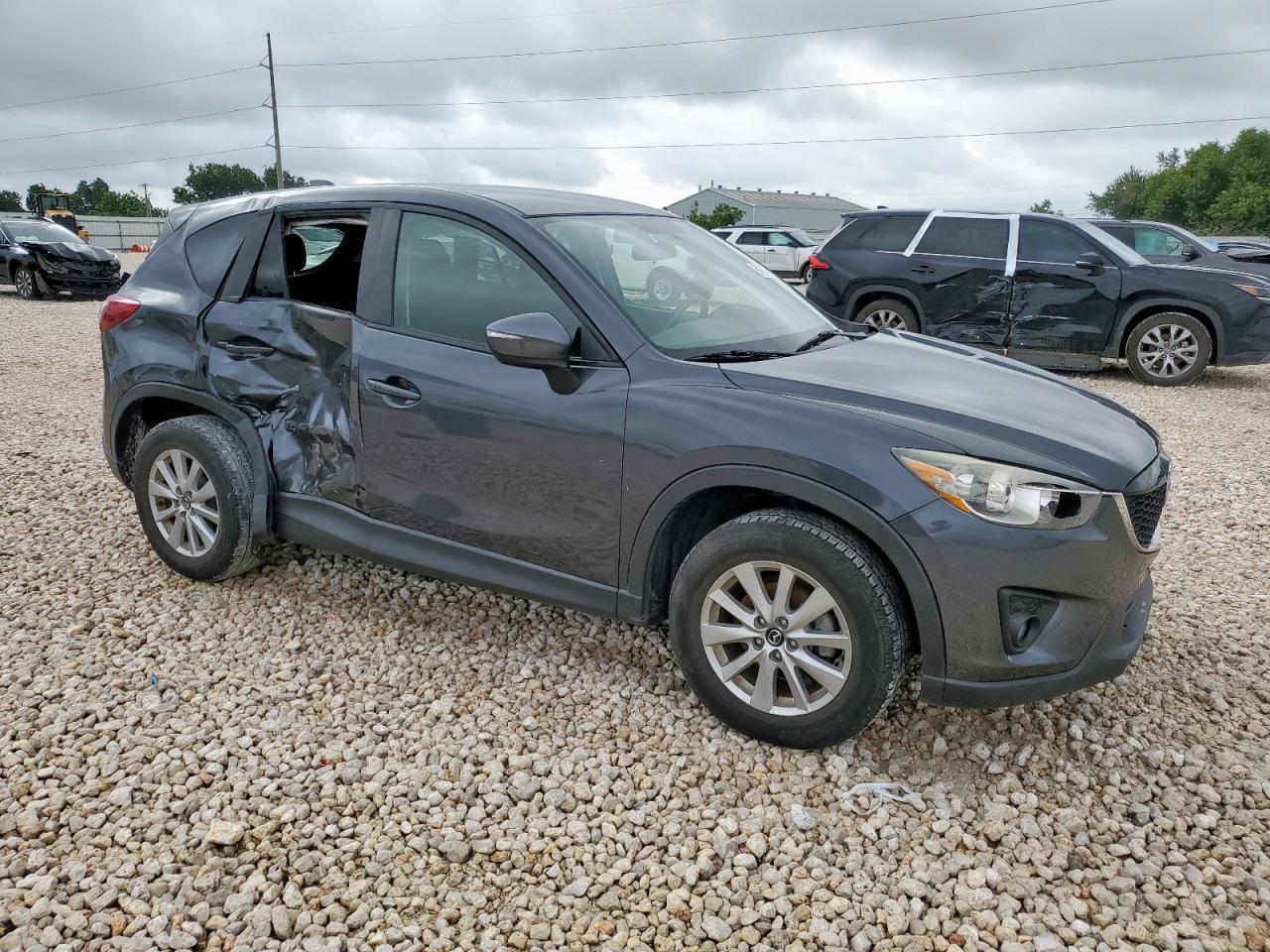 2015 Mazda Cx-5 Touring VIN: JM3KE2CY1F0548256 Lot: 64115345