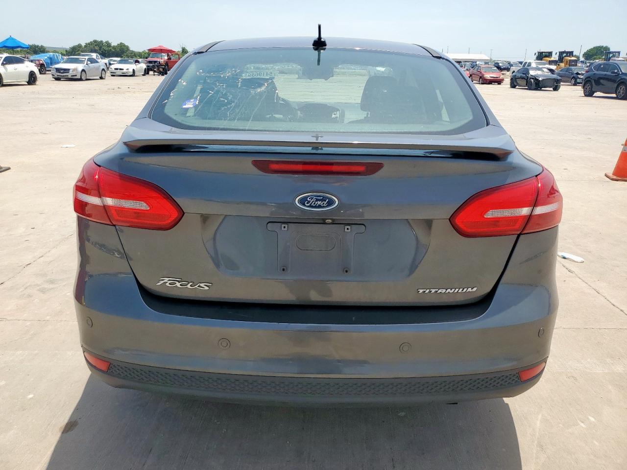 2017 Ford Focus Titanium VIN: 1FADP3J20HL253446 Lot: 64196895