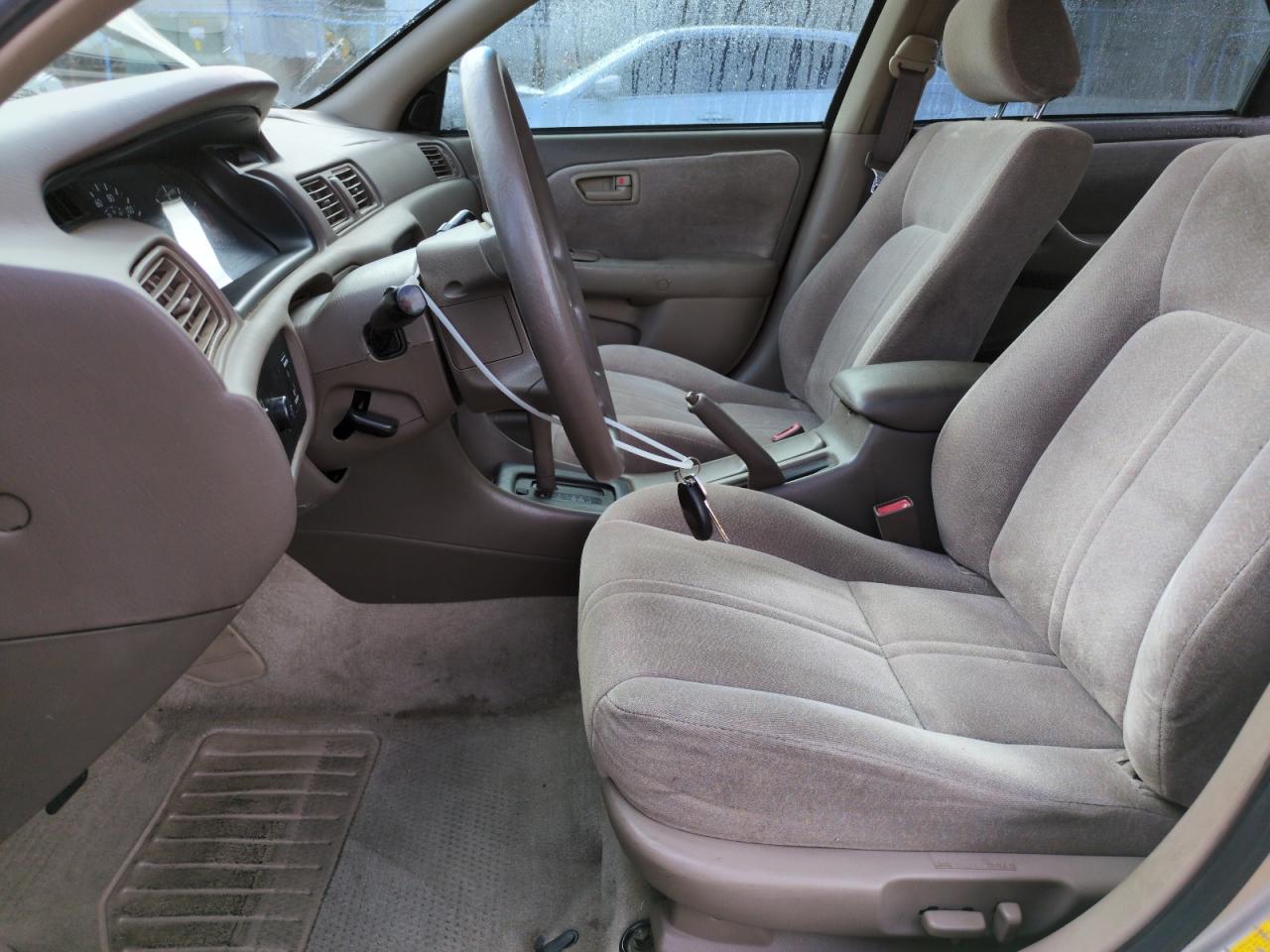 1999 Toyota Camry Le VIN: JT2BG28KXX0350213 Lot: 63525895