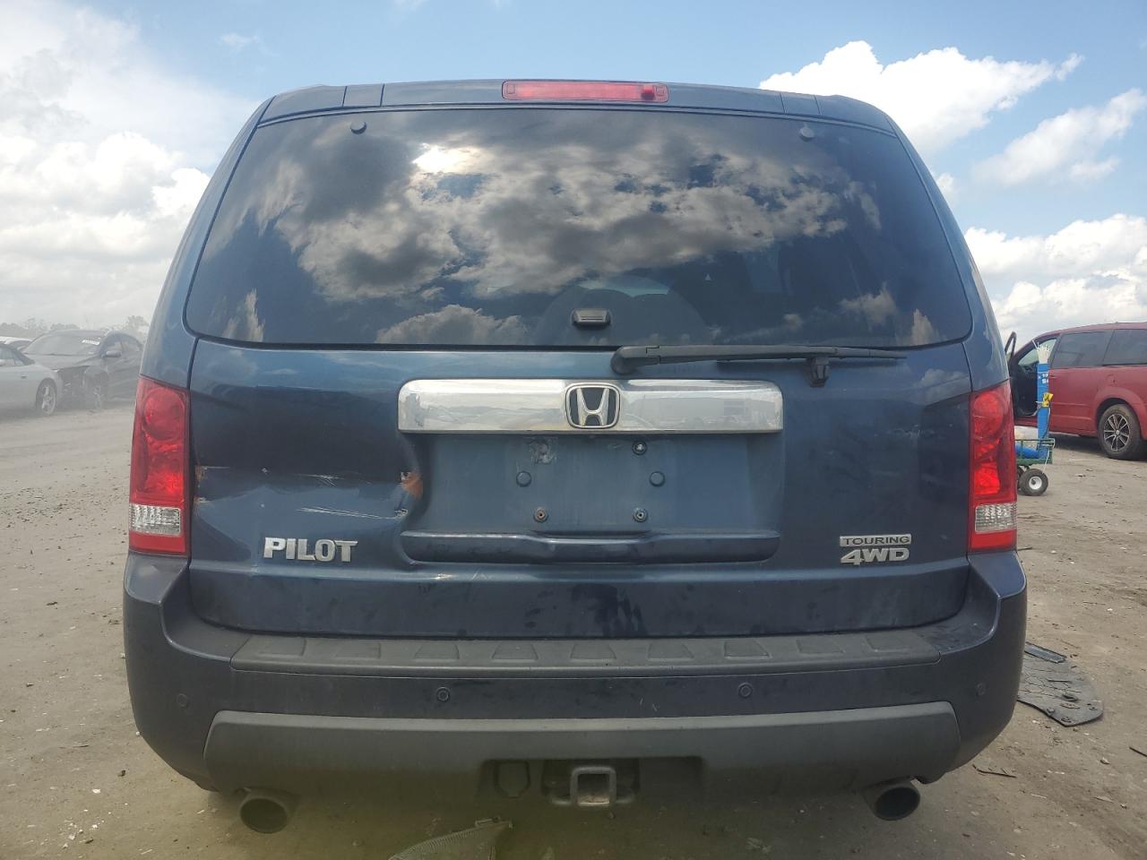 2010 Honda Pilot Touring VIN: 5FNYF4H85AB003241 Lot: 64334555